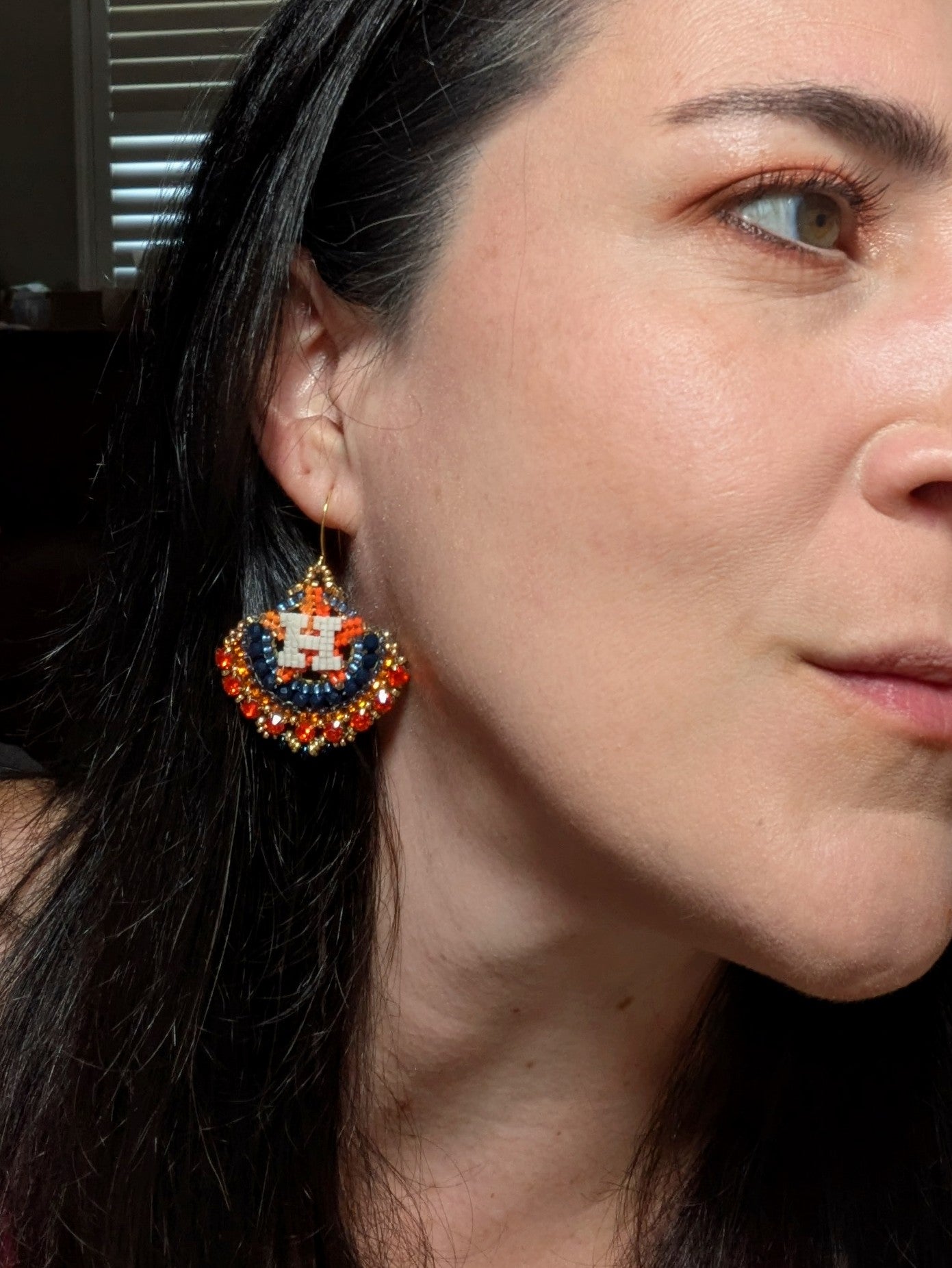 Round gold blue and orange dangles with beautiful orange crystal montees, on gold plated sterling silver hooks.