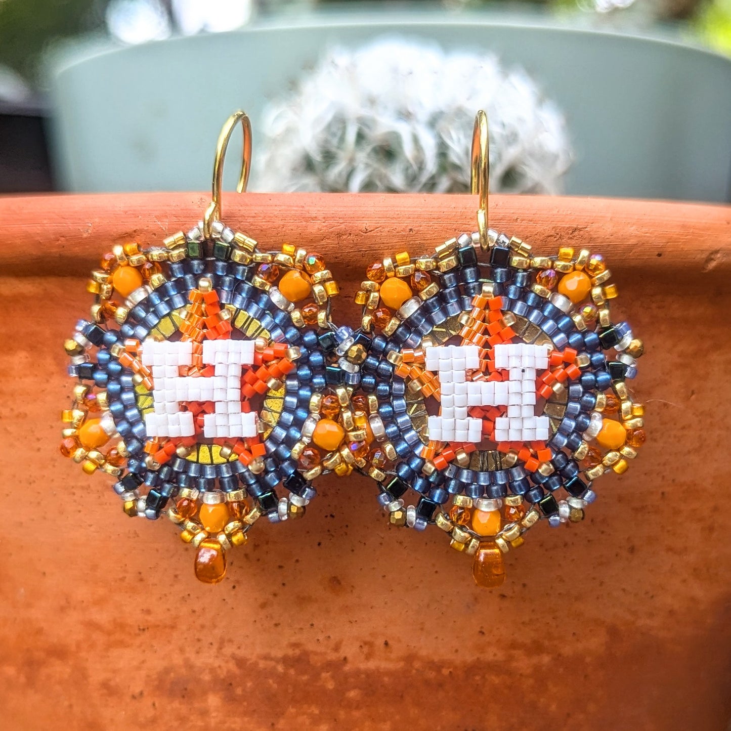 Round Houston Star Earrings - Blue and Orange cz crystals, gold plated sterling silver hooks