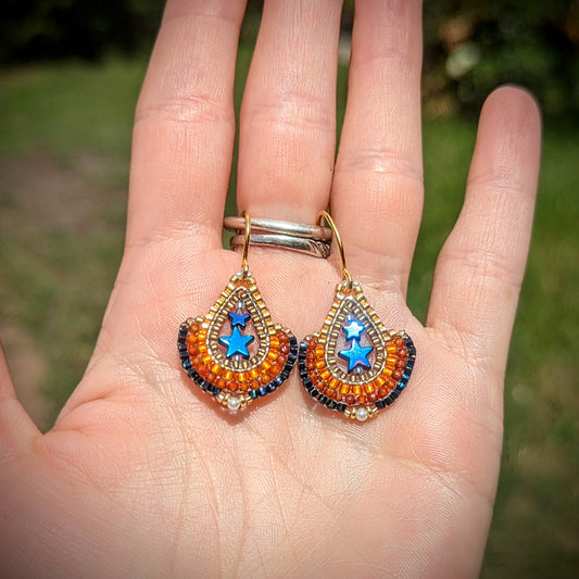 Teny tiny blue hematite star drops, with freshwater pearls on gold plated sterling silver hooks
